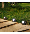 Tradineur - Pack de 3 lámparas solares con forma de piedra, foco, luz LED decorativa, impermeable, ecológica, jardín, patio, exterior (Gris - 11,5 x 9 x 9 cm)