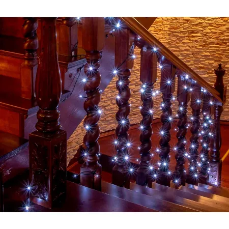 Tradineur - Tira de 140 luces navideñas LEDs - Apto para interiores - Función de luz fija e intermitente - 11 Metros - Color Bla Tradineur - Tira de 140 luces navideñas LEDs - Apto para interiores - Función de luz fija e intermitente - 11 Metros - Color Bla
