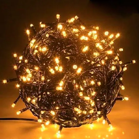 Tradineur - Tira de 300 luces LEDs - Apto para interiores - Función de luz fija e intermitente - 24 Metros - Color Luz cálida Tradineur - Tira de 300 luces LEDs - Apto para interiores - Función de luz fija e intermitente - 24 Metros - Color Luz cálida