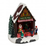 Puesto de santa claus decorativo, tienda de juguetes de papá noel con luces LED, música y movimiento 25,5 x 23 x 17 cm, resina y plástico, casita nevada con figuras, decoración de navidad