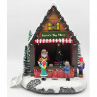 Puesto de santa claus decorativo, tienda de juguetes de papá noel con luces LED, música y movimiento 25,5 x 23 x 17 cm, resina y plástico, casita nevada con figuras, decoración de navidad